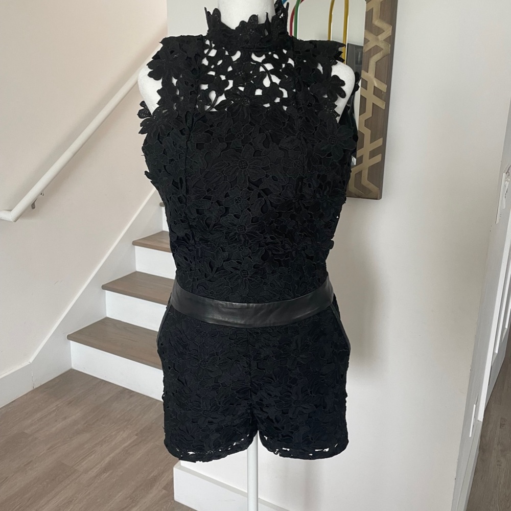 La Marque Crochet Short Romper with open back and leather accents